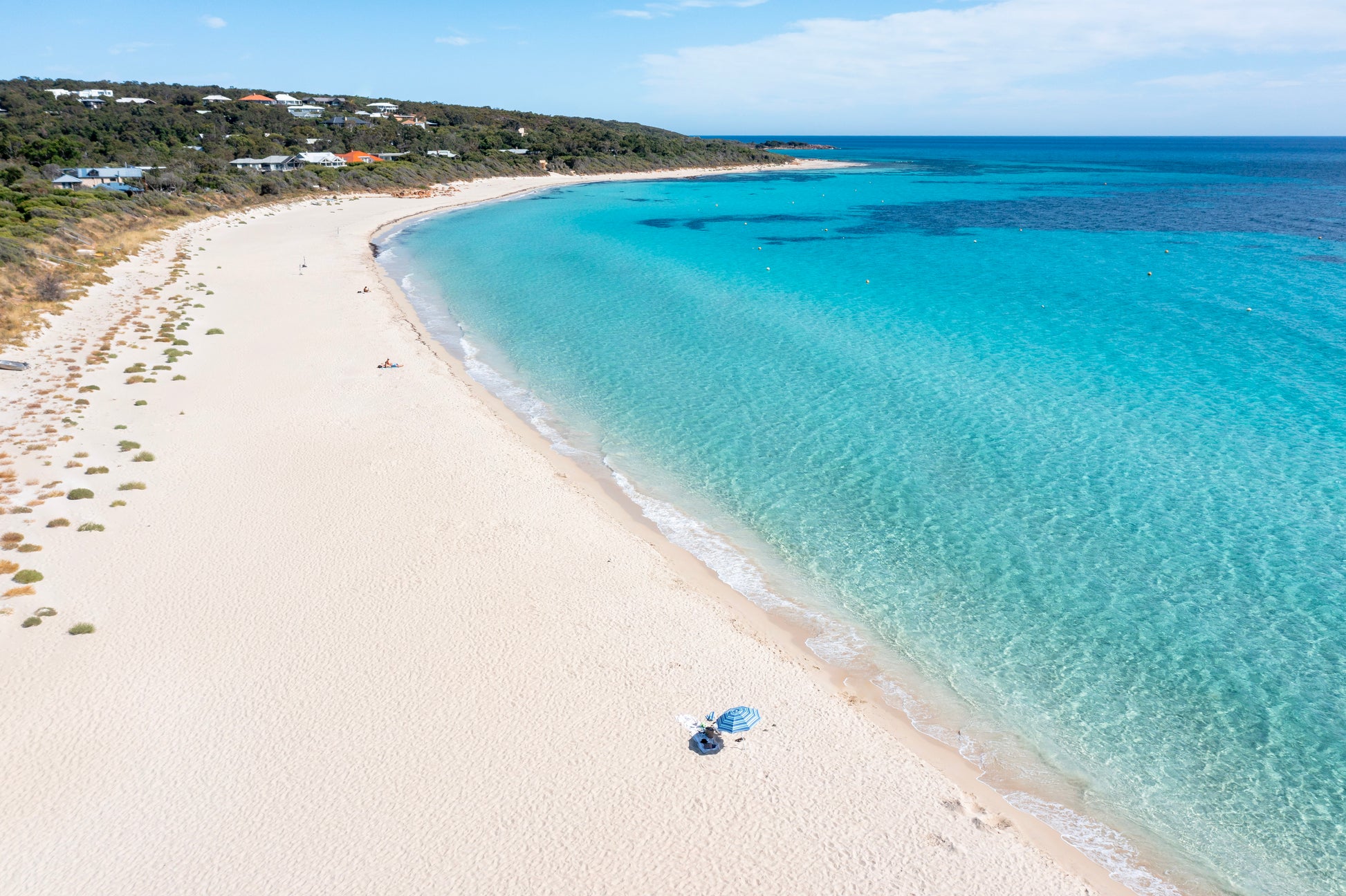 Beach with clear blue water and white sand