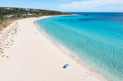 Beach with clear blue water and white sand