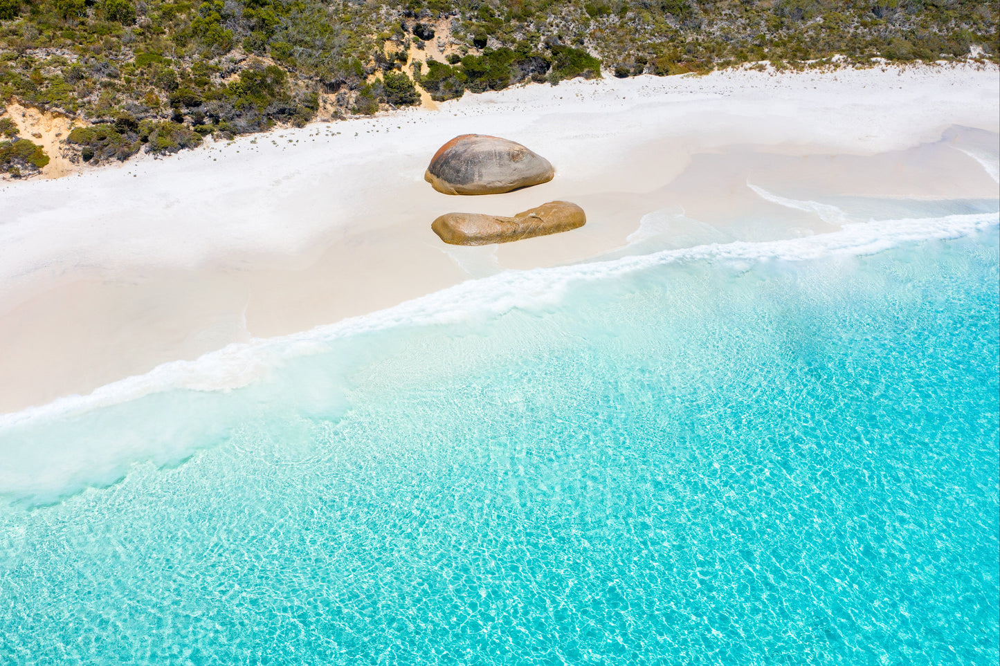 Beach with clear turquoise water and white sand